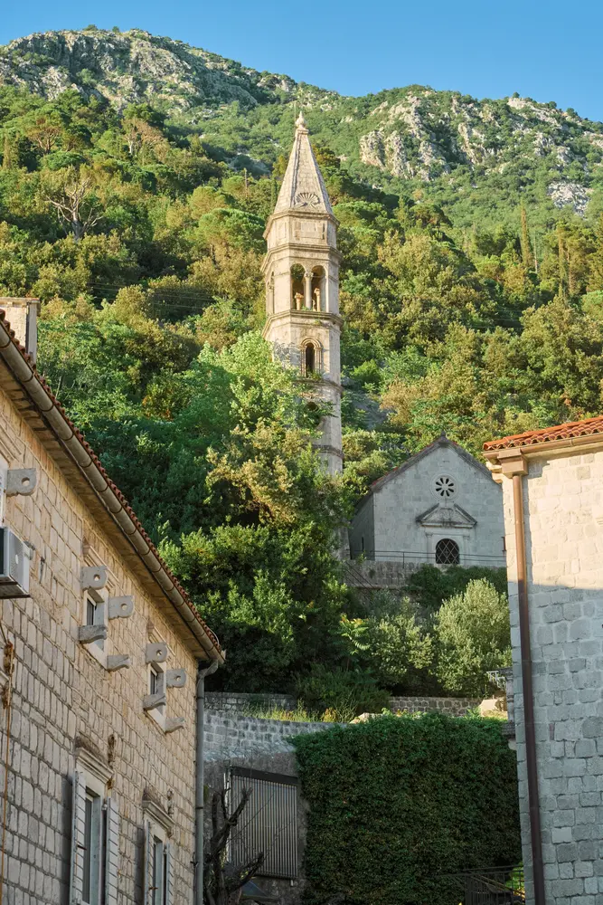 2026-06-12_perast_bell-tower-above-rooftops_dsc06403.jpg